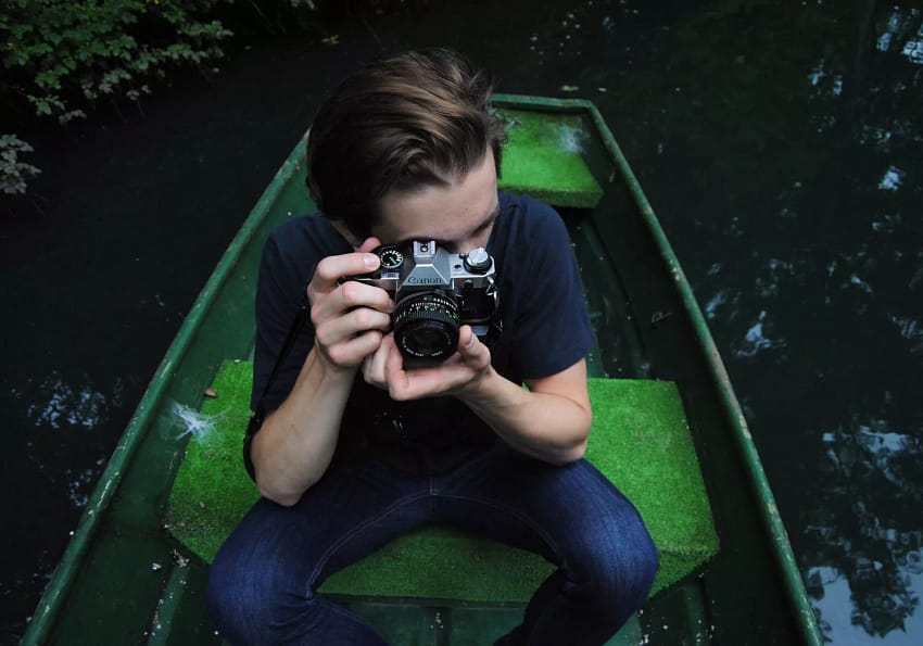 man water person boat camera photography 1084860 pxhere 65de3282dac